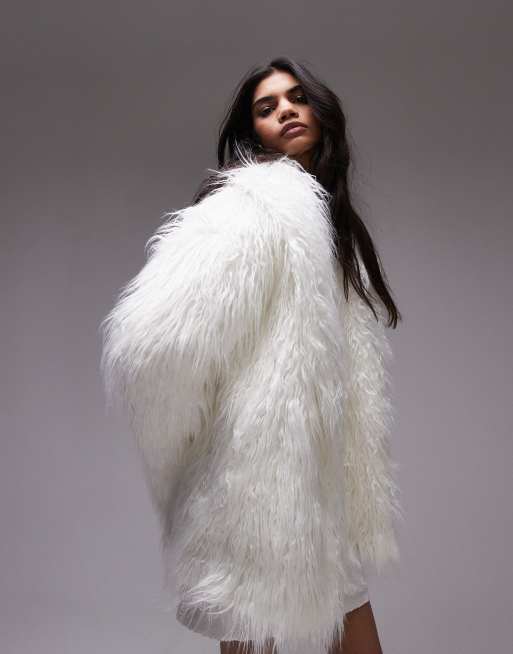 Topshop faux mongolian fur long coat in white