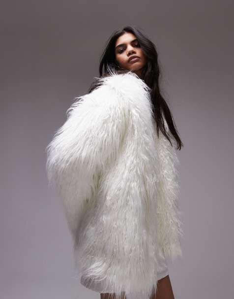 Topshop faux mongolian fur mid lenght coat in white - view 1