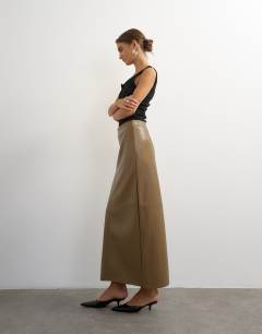 Model wearing Faux ostritch leather topstitch column maxi skirt in tan