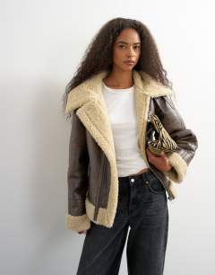 Model wearing Faux shearling aviator in brown