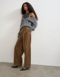 Model wearing Faux suede barrel leg trouser in choc