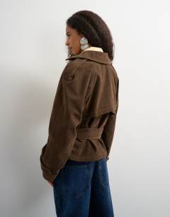 Model wearing Faux suede belted trench in chocolate