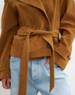 Model wearing Faux suede belted trench in tan