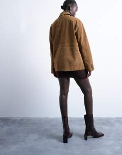 Model wearing Faux suede boxy casual shacket in tan