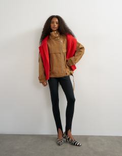 Model wearing Faux suede fold funnel biker in tan