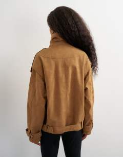 Model wearing Faux suede fold funnel biker in tan