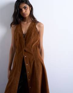 Model wearing Faux suede hidden button plaquette midi dress in brown