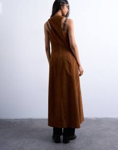 Model wearing Faux suede hidden button plaquette midi dress in brown