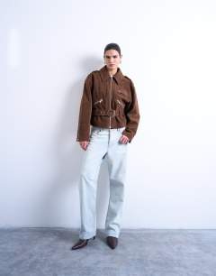 Model wearing Faux suede low belted biker jacket in washed brown