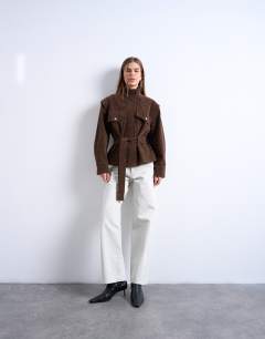 Model wearing Faux suede low belted funnel neck jacket in brown