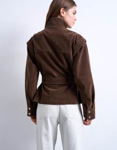 Model wearing Faux suede low belted funnel neck jacket in brown