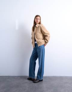 Model wearing Faux suede oversized bomber in stone