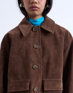 Model wearing Faux suede patch pocket boxy jacket in brown