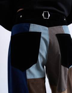 Model wearing Faux suede patchwork cinch trousers in blue