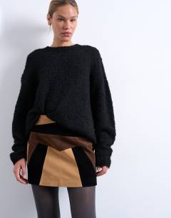 Model wearing Faux suede patchwork mini skirt in brown