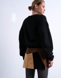 Model wearing Faux suede patchwork mini skirt in brown