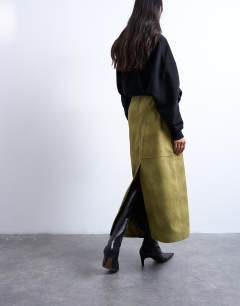 Model wearing Faux suede seamed midi skirt in avocado