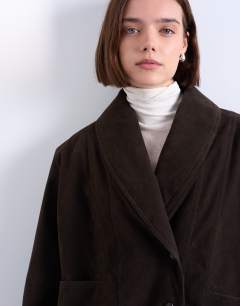 Model wearing Faux suede shawl bomber jacket in chocolate