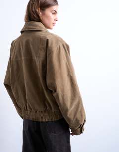 Model wearing Faux suede shawl bomber jacket in tan