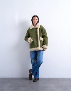 Model wearing Faux suede shearling oversized car coat in olive green