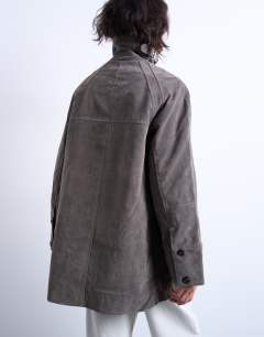 Model wearing Faux suede short funnel neck car coat with neck tab in grey