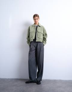 Model wearing Faux suede short jacket with patch pockets in sage