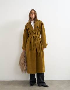 Model wearing Faux suede trench in mustard olive