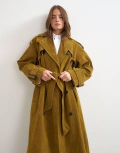 Model wearing Faux suede trench in mustard olive