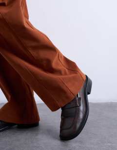 Model wearing Faux suede wide leg trouser with seam detail in rust