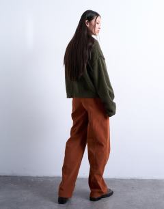 Model wearing Faux suede wide leg trouser with seam detail in rust