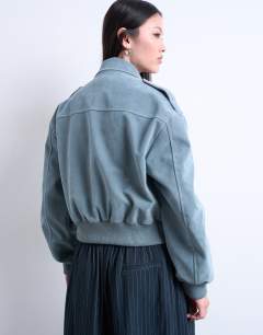 Model wearing Faux suede zip through jacket with patch pockets in blue