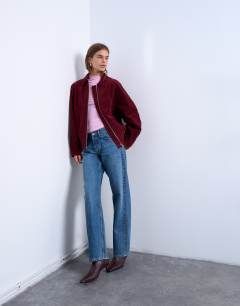 Model wearing Faux suede zip through seam detail jacket in burgundy
