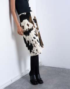 Model wearing Fax fur pony skin a-line midi skirt in cow print
