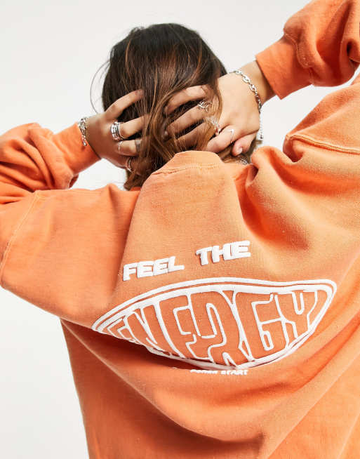 Topshop feel the energy graphic vintage style sweat in orange