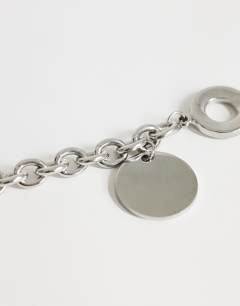 Model wearing Felix waterproof charm bracelet in stainless silver