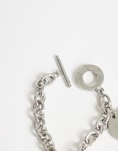 Model wearing Felix waterproof charm bracelet in stainless silver