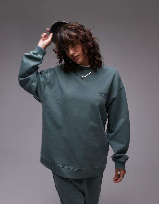Topshop - Felpa verde oversize con stampa “Community” in coordinato