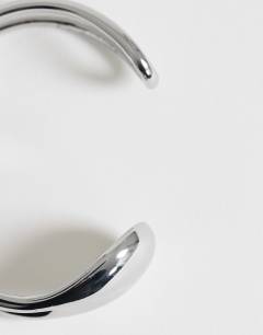 Model wearing Femi cuff bracelet in silver