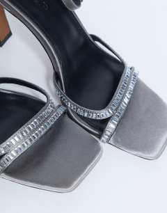 Model wearing Fifi embellished flare heel sandal in silver 