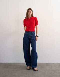 Model wearing Fine knitted cinch waist polo in red