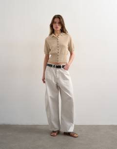 Model wearing Fine knitted towelling cinch waist polo in oat