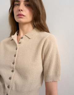 Model wearing Fine knitted towelling cinch waist polo in oat