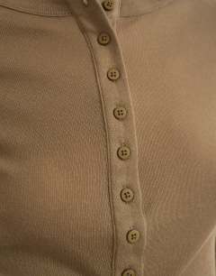 Model wearing Fitted long sleeve henley in khaki