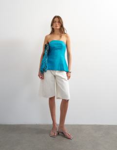 Model wearing Fitted tailored bandeau in teal