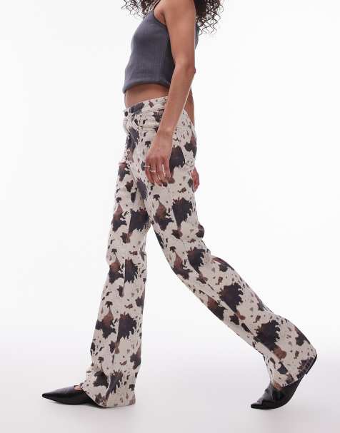 Topshop - Flared jeans in jaren 90 stijl met halfhoge taille en koeienprint - view 1