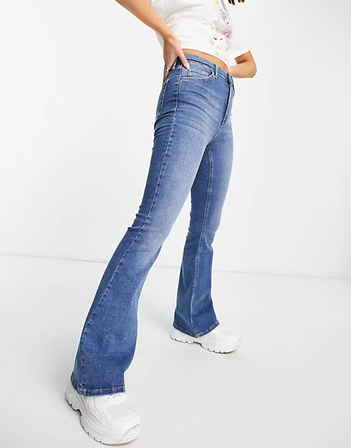 Topshop flared jeans in mid wash blue | ASOS