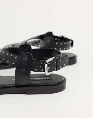 black leather studded sandals