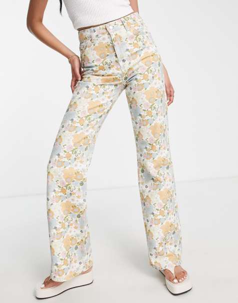 Topshop – Flerfärgade, retroblommiga, utsvängda jeans i 90-talsstil - view 1