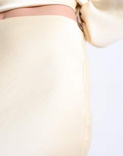 Model wearing Flood length maxi bias skirt in buttermilk