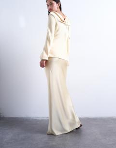 Model wearing Flood length maxi bias skirt in buttermilk